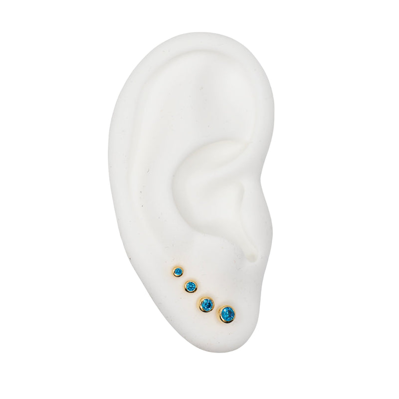 Yellow Gold Studs Graduated Blue Topaz Stud Earring Set The Curated LobeBirthstone Stud EarringsBlue Topaz StudsDecember Birthstone Studs